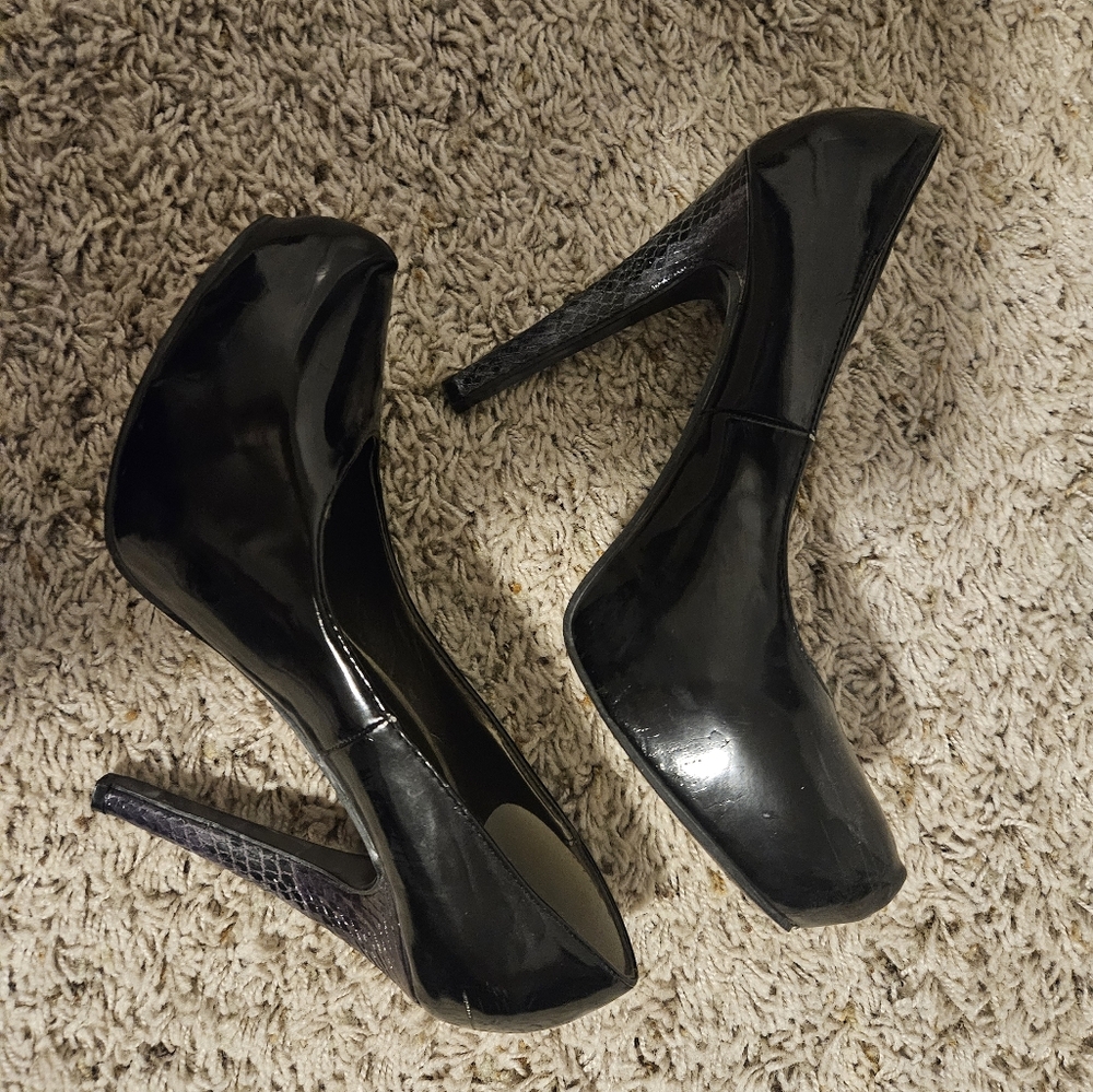 Black patent stilletos with purple heels